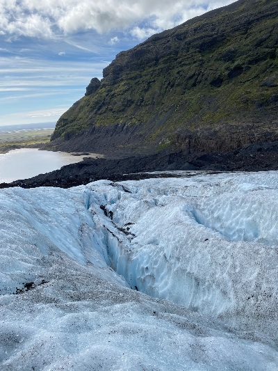 The view over a big crack in Falljokull glacier in Iceland