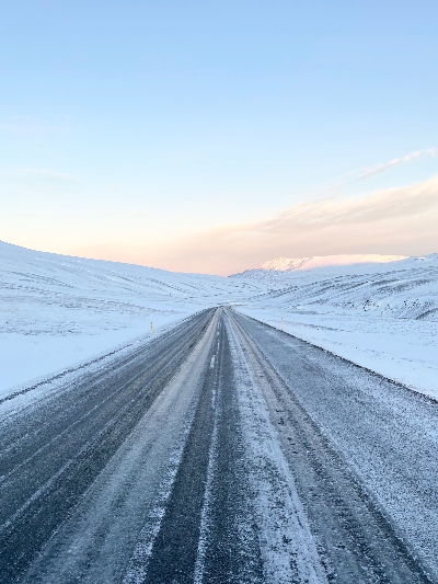 Driving in Iceland in winter on a snowy road