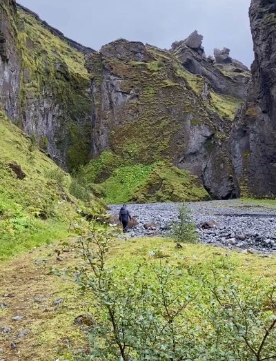 A man reaching the end of Stakkholtsgjá Canyon in Iceland