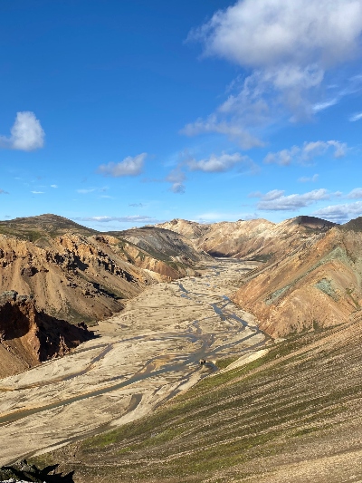 Stunning golden views over rhyolite mountains and valley while hiking in Landmannalaugar