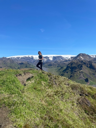 A woman hiking Valahnúkur in Þórsmörk Iceland