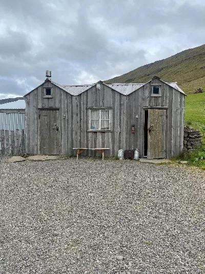 Old looking timber house at the Wilderness Center where you'll find sauna and a hot tub